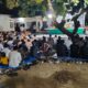 Polsek Maluk Amankan Kegiatan Bersih Desa dan Sedekah Bumi di Bukit Damai, Wujud Nyata Polri Dekat dengan Masyarakat