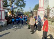 Polsek Pringgarata Amankan Karnaval HUT RI ke-80.