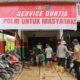 Bangkit Bersama Polri: Kapolres Tapteng Layani Service Motor Gratis untuk Warga Terdampak
