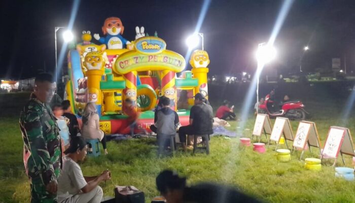 Kehadiran Babinsa di Pasar Malam Bawa Rasa Aman Warga