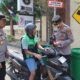 Polres Bima Kota Bagikan Ratusan Bendera, Ajak Masyarakat Kobarkan Semangat Kemerdekaan