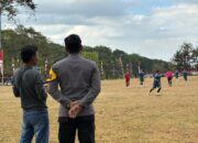 Bhabinkamtibmas Polsek Batu Lanteh Amankan Pertandingan Sepak Bola Mini Bupati Cup 2026 di Desa Batu Dulang