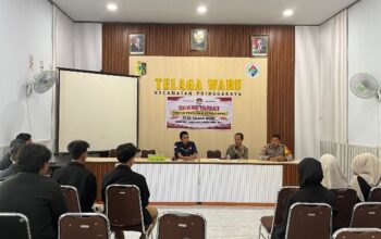 Bhabinkamtibmas Desa Telaga Waru Hadiri Penerimaan Mahasiswa KKN IAIH Pancor, Ajak Jaga Kondusivitas Jelang Pilkades 2027